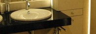 Bathroom Design. Luxury Bathroom made from Limestone & black Granite - Detail of the granite vanity top.jpg